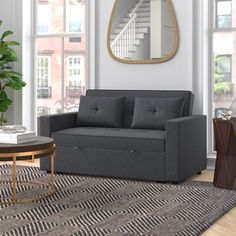 a living room scene with focus on the sofa