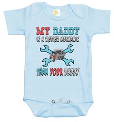 Rapunzie's adorable baby onesie with a playful and cheeky caption: "My Daddy is a Better Mechanic Than Your Daddy." Made from 100% cotton, this onesie is designed for maximum comfort and style for your little one. The onesie features short sleeves, perfect for warmer days or as a layering piece under a cozy sweater. Its soft and breathable fabric ensures that your baby stays comfortable throughout the day, making it ideal for both playtime and nap time. Available in three delightful colors, whit Gender Reveal Ideas Mechanic, Funny Onesie With Letter Print For Playtime, Mechanic Photoshoot Baby, Mechanic Themed Nursery, Funny Graphic Print Short Sleeve Bodysuit, Funny Graphic Print Onesie For Playtime, Blue Cotton Bodysuit With Letter Print, Cotton Onesie With Funny Text, Fitted Blue Onesie With Letter Print