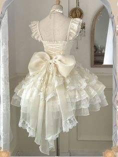 Winter Theme Dresses, Short Dress Long Train, Short Extra Dresses, Pretty Dresses For Homecoming, Train Dress Gowns, Big Ruffle Dress, Dresses From 1800s, Bow In Back Of Dress, Short Wedding Dress Big Bow