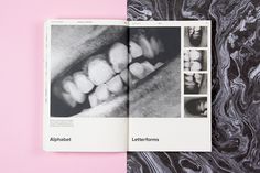 an open book with pictures of teeth on the cover and in it's center