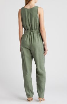 Get to the fun faster in a one-and-done jumpsuit cut from lightweight linen and perfected with a pair of pockets. 57 1/2" length; 30" inseam; 16" leg opening (size Medium) Hidden side-zip closure Surplice V-neck Sleeveless Side-seam pockets 100% linen Machine wash, line dry Made in Portugal Sleeveless Summer Overalls With Side Pockets, Casual Linen Jumpsuits And Rompers, Casual Sleeveless Jumpsuits And Rompers With Pockets, Casual Sleeveless Jumpsuits With Slip Pockets, Casual Linen Jumpsuits And Rompers For Work, Sleeveless Overalls With Side Pockets In Relaxed Fit, Sleeveless Linen Overalls For Summer, Sleeveless Cotton Jumpsuit With Elastic Waistband, Sleeveless Cotton Jumpsuits And Rompers With Elastic Waistband