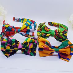 "This vibrant authentic African side bow headband is the perfect addition to your wardrobe and perfect unique gift for her! Size: 4.5\"x 6\" Color: Multicolor  Material: African Ankara fabric Due to screen resolution, color may appear different than the actual product. Fabric patterns may not look identical due to variances in fabric prints. Each pair may look slightly different from the one pictured, which gives you unique custom beautiful earrings hand-crafted just for you! check out our shop Bow Headbands, African Ankara, African Inspired Fashion, Fabric Prints, Ankara Fabric, Unique Gifts For Her, African Inspired, Turbans, Hair Accessories Headbands