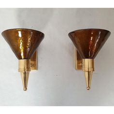 Pair of Mid Century Modern Murano glass and brass sconces, Attributed to Sciolari, Italy 1970s. The vintage sconces are made of a thick Murano glass cone, nesting the light and brass mounts. The Murano glass is mirrored, in a warm dark caramel color. It lets some light through when lit, and creates a halo projection on the wall. Note that we used only 20W light bulbs on the pictures. If you use a 90W bulb the halo of light will be more important and intense. The pair of Murano sconces are profes Unique Bathroom Lighting, Living Room Wall Sconces, Wall Sconces Bathroom, Italian Wall Lights, Kitchen Sconces, Art Deco Wall Sconces Vintage, Wall Light Fixtures 70s, Mid Century Light Fixtures, Hanging Sconces