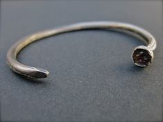 Cool, tough, and industrial, this bracelet is a must for the punk rocker in you (and we all have an inner punk rocker, no?). This bracelet is based on this ring: https://www.etsy.com/listing/65300879/nail-ring-hand-forged-sterling-silver The original was a custom order, but I liked it so much, I decided to offer it in my shop. Hand-fabricated in sterling silver, patinated, and given a realistic scratched finish, this bracelet looks just like the real thing. Despite its tough exterior, it is rema Steel Boots, Metal Gifts, Mens Bracelet Personalized, Nail Bracelet, Hardware Jewelry, Nail Ring, Punk Rocker, Nautical Jewelry, Mens Wear