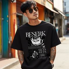 Guts Beserk Vintage Tee - Unleash the relentless spirit of Guts from Berserk. This mineral wash t-shirt showcases the iconic warrior and the Berserk logo, blending style with raw power. Perfect for anime fans who admire the resilience and strength of their favorite hero! ✨for oversized fitting please size up 1-2 sizes from normal unisex size, please refer to size chart attached!✨ 🔥ABOUT THE TSHIRT🔥 This Comfort Colors shirt is a great addition to any wardrobe! The mineral wash pattern may show Anime Style T-shirt With Front Print For Streetwear, Casual Letter Print T-shirt For Cosplay, Anime Style Crew Neck T-shirt For Streetwear, Anime Style Letter Print T-shirt For Streetwear, Anime Streetwear T-shirt (pre-shrunk), Anime Style Pre-shrunk T-shirt For Streetwear, Anime Graphic Print Tops For Streetwear, Anime Style Black Top For Streetwear, Anime Graphic T-shirt For Streetwear