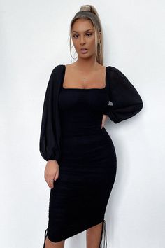 Stand out in the crowd in the Lorde Dress in Black. This babe features an all over ruched fabrication with tie up detail on each side of the dress, off the shoulder, sheer long sleeves and is completed with invisible back zipper. She looks amazing when paired with your go to nude heels and gold jewellery.  FABRICATION: Ruched Long Sleeve Bodycon Evening Dress, Square Neck Mini Dress With Sheer Sleeves, Trendy Square Neck Midi Dress For Party, Square Neck Party Dresses With Sheer Sleeves, Elegant Mini Dress With Sheer Sleeves And Square Neck, Fall Party Off-shoulder Long Sleeve Dress, Chic Long Sleeve Dress With Square Neck For Party, Chic Ruched Long Sleeve Dress For Date Night, Ruched Bodycon Long Sleeve Dress For Party