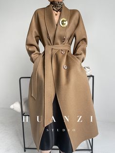 Introducing the Huanzi Vellor tweed blazer coat, the epitome of class and sophistication. Crafted with high-end double-sided cashmere wool, it is designed to be chic, elegant, fashionable, and classy - perfect for the discerning individual who prefers to make a statement of style and high class. Perfect for the fall and autumn seasons. 【Size Information】 size Raglan sleeves chest circumference waistline clothes length S 70 108 110 115.5 m 71 112 114 116.5 Luxury Brown Wool Coat With Double Button Closure, Luxury Single Breasted Beige Wool Coat, Luxury Beige Single Breasted Wool Coat, Elegant Beige Tweed Jacket With Lapel Collar, Formal Brown Wool Coat With Long Sleeves, Elegant Beige Outerwear With Lapel Collar, Chic Cashmere Sweater Coat For Winter, Luxury Beige Double-breasted Wool Coat, Elegant Cashmere Outerwear