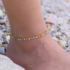 This gold Satellite chain anklet is for women. Its boho style makes it a great piece of summer jewelry. The ankle bracelets have an extension so the size can be adjusted. Trendy Handmade Gold Anklets, Bohemian Gold Beaded Bracelets For Summer, Handmade Trendy Gold Anklets, Gold Bohemian Beaded Bracelets For Summer, Summer Gift Anklets With Gold Beads, Adjustable Chain Bohemian Beaded Bracelets, Gold Anklets With Beads For Summer, Trendy Gold Anklets For Festivals, Gold Anklets With Colorful Beads For Summer