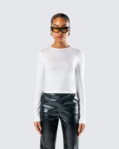 Nothing screams “timeless basic” like a white long sleeve top 🤍 With a versatile style and sleek fit, this piece is made from stretch jersey fabric and complete with a bodycon fit and a crew neck design 😌 White Bodycon Top For Night Out, Fitted Crew Neck Long Sleeve Top For Night Out, Trendy Fitted Long Sleeve Top, Fitted White Long Sleeve Top, Sleek White Fitted Top, Fitted Long Sleeve Crew Neck Top In Elastane, White Long Sleeve Sports Tops, Fitted White Long Sleeve Top Trendy, Trendy White Fitted Long Sleeve Top