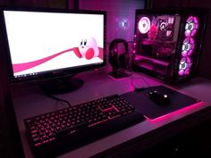 a desktop computer sitting on top of a desk next to a keyboard and mouse in front of a monitor