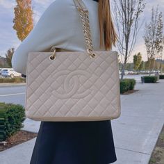 CHANEL Beige Quilted Caviar Grand Shopping Tote 0811XYH001 Product Details CM INCH Width 34 13.39 Height 25 9.84 Strap 55 21.65 Depth 15 5.91 Color: Cream, Gold chain Leather: Calfskin Year: 2012 Accessory: None Condition: Very good Sub-category: Shoulder bag Please Note: All products in our store are second-hand and vintage. ITEM LOCATION IS CANADA. Duties are set by the destination country/province's customs authorities. We are not responsible for paying any duties. These are the actual photos of the item. This item was cared for by a previous owner. Due to its vintage nature, the item shows signs of normal wear Delivery 5-8 or 10-15 working days Please note that during high season and Sale period, delivery times may be affected We accept payment with a Credit card, Debit card, or PayPal Chanel Beige, Chanel Tote, Vintage Nature, Vuitton Bag, Shopping Tote, Leather Chain, Prada Bag, Dior Bag, Gold Chain