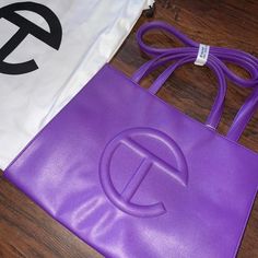 Telfar Shopping Bag Brand New Medium Size Grape Shopping Bag Comes With Dust Bag Sold Out Price Is Firm No Free Shipping #Palmangels #Telfar #Bag #Hat #Shirt Purple Telfar Bag Outfit, Trendy Purple Bag With Dust Bag Included, Designer Purple Tote Bag, Designer Purple Bags With Handles, Purple Tote Shoulder Bag With Dust Bag, Purple Shoulder Bag For Shopping, Purple Shopping Bag With Detachable Handle, Purple Telfar Bag, Telfar Bags Medium