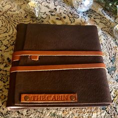 a brown book sitting on top of a table