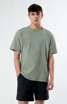 Keep things cool and casual with help from the Reece Regular T-Shirt. This new PacSun go-to has an easy regular fit, a soft cotton construction, and a versatile solid color design.   	Solid color tee 	Crew neck 	Short sleeves 	Regular fit 	100% cotton 	Machine washable 	Model is wearing size medium Men’s Tshirt Outfits, Mens Outfits Tshirt, Men’s Basics, Tshirts For Men Casual, Mens Tshirt Outfit Casual, Guys Clothing Styles Casual, Men’s Shirts, Men Tshirt Outfits, Basic Mens Outfits