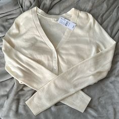 This Is A Long Sleeve Thicker Material Shirt, Not Sure If I Would Quite Consider It A Sweater But It Is Such A Cozy Material! Not Cropped And Can Go With A Dressy Look! Classic Winter Tops For Day Out, White Fitted Everyday Cardigan, Cozy Beige Button-up Sweater, Cream Long Sleeve Sweater With Button Closure, Retro Cream Button-up Tops, Pacsun Sweater, Pacsun Long Sleeve Tops, Black Flannel Shirt, Red And Black Flannel