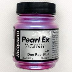 a jar of purple acrylic paint sitting on a white surface with the words pearl ex powdered pigments