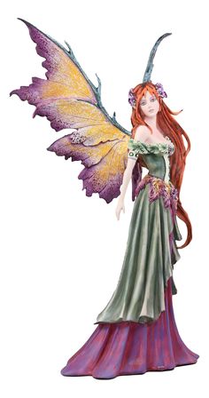 a figurine of a woman with long red hair wearing a green and purple dress