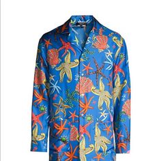 Colorful Aquatic Creatures Adorn This Pajama Shirt In An Allover Manner. Notch Collar Long Sleeves Button Front Silk Dry Clean Made In Italy Size 5 / Us50 Large Size & Fit About 32" From Shoulder To Hem About The Brand Founded In 1978, Versace Is Instantly Recognizable By The Signature Medusa Head Logo, Chosen By Founder Gianni Versace For Its Greek Symbolism. The Italian Label Is Known For Its Luxe, Bold Clothing, Sneakers, Shoes And Accessoriesthink Gilding, Oversized Logos And Punchy Prints. Blue Long Sleeve Sleepwear For Vacation, Mens Silk Shirts, Aquatic Creatures, Versace Blue, Versace Pink, Short Sleeve Linen Shirt, Silk Pajama, Versus Versace, Versace Collection