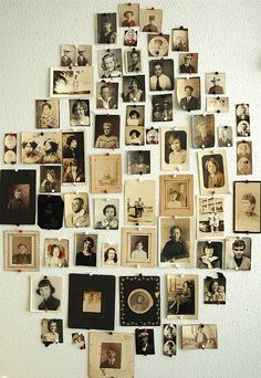 the wall is covered with many pictures and words in different languages, including one that has been