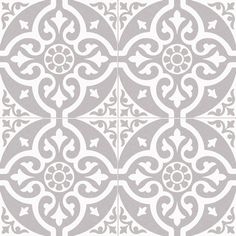 an intricate tile design in grey and white