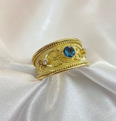 London Blue Topaz Ring | Byzantine Style Ring | Handmade Jewelry | 18K Yellow Gold Ring | Diamond Stones | Gift for Her | Mother's Day Gift RING DETAILS: Material: 18K Yellow Gold  London Blue Topaz: 0.35 CT Diamond Stones :0.03 CT ✪ With the ring you will receive an official gemological certificate! ♦ Payment Options Available  ♦ Free Shipping Via FedEx ♦ All pieces come in gift box  ♦ All our jewelry comes with a certificate 💖Welcome To Our Shop , Great To Know You All Here  Discover the fine Gold Blue Topaz Ring For Gift, Gold Topaz Ring With Intricate Design For Gift, Gold Topaz Ring With Intricate Design As Gift, Gold Sapphire Ring With Intricate Design As Gift, Heirloom Gold Ring With Blue Topaz, Heirloom Gold Blue Topaz Ring, Heirloom Gold Topaz Ring With Blue Topaz, Gold Ring Diamond, Yellow Gold Diamond Ring