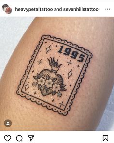 a small tattoo on the leg of a woman