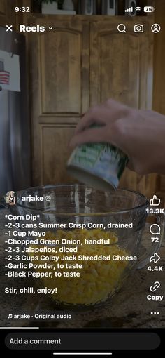 someone is adding corn to a bowl on the kitchen counter with instructions for cooking it