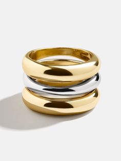 Unleash your bold side with the Moxie Ring. An extra long statement piece, this ring is gorgeously gold with a sliver of silver to create some mixed metal magic. Perfect for stacking or shining solo, the Moxie Ring adds a dash of daring to any look. Stacked Rings Mixed Metal, Mixed Metals Ring Stack, Everyday Rings Gold, Mixed Metal Ring Stack, Mix Metal Jewelry, Silver And Gold Jewelry Mixing, Rings Mixed Metals, Ring Stacking Ideas, Mixed Metals Jewelry Style