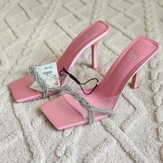 Rhinestone Vinyl High Heel Sandals Vinyl High Heel Slide Sandals. Woven Rhinestone Straps. Squared Toe. Heel Height: 3.7 Inches (9.5 Cm) Share Shopping Bag (19) Rhinestone Vinyl High Heel Sandals View Similarout Of Stock Vinyl High Heel Slide Sandals. Woven Rhinestone Straps. Squared Toe. Heel Height: 3.7 Inches (9.5 Cm) Airfit. Flexible Technical Sole Made Of Latex Foam Designed To Offer Increased Comfort. See More Pink | 1324/010 Composition & Care Composition We Work With Monitoring Programs Bedazzled High Heel Sandals For Summer, Bedazzled Sandals For Spring Party, Trendy Rhinestone Evening Sandals, Chic Bling Sandals For Summer, Chic Summer Sandals With Bling, Chic Bedazzled Heels For Summer, Zara Silver Heels With Rhinestones, Silver Bling Sandals For Spring, Chic Pink Sandals With Rhinestones