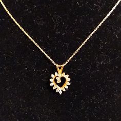 Pretty And Petite, This Little 14k Yellow Gold Genuine Diamond Heart Pendant Is Only 1/4" By 1/4". Approx .33ctw. Comes With A Delicate 18" 14k Yellow Gold Chain. Stamped 14k. Perfect For Valentine's Day....Or Any Day. 14k Gold Heart Pendant Diamond Necklace For Anniversary, Formal Diamond Heart Charm Jewelry, Formal Diamond Necklace With Heart Pendant, 14k Gold Heart Pendant With Single Cut Diamonds, Heart-shaped 14k Gold Jewelry With Single Cut Diamonds, 14k Gold Heart Jewelry With Single Cut Diamonds, 14k Gold Jewelry With Heart Cut Diamond Accents, 14k Gold Heart Cut Jewelry With Diamond Accents, 14k Gold Heart Cut Diamond Accented Jewelry