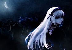 a woman with long white hair standing in the dark