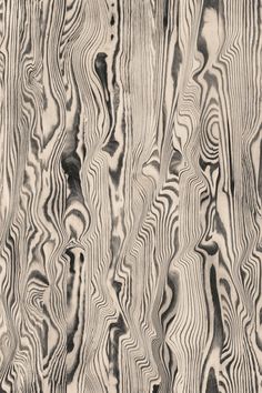 an abstract wood grain pattern in black and white