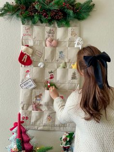 Welcome to my handmade shop! The linen fabric christmas advent calendar with embroidery pouch❤️ Each pouches that I embroidery every date and lovely christmas design. Make your special christmas with this calendar! Fabric and Size -100% natural linen and. red gingham fabric inside the each pockets -20x39 inch (it can't be 1~2 cm different) -each pocket(pouch) 3 5/7 x5inch  ** wooden hager and all the decoration on calendal is not included ** **fabric calendal Only** Shipping -It'll take 10~15 working days (or less)  -shipping from colorado, usa Sewing Advent Calendar, Embroidery Advent Calendar, Handmade Advent Calendar, Pocket Advent Calendar, Cloth Advent Calendar, Embroidered Advent Calendar, Advent Calendar Pouches, Linen Advent Calendar, Embroider Advent Calendar