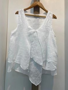 White Linen Sleeveless Vest, Sleeveless Linen Summer Vest, Sleeveless Summer Tank Top For Layering, Summer Tank Vest For Layering, Spring Sleeveless Linen Camisole, Linen Sleeveless Vest For Layering, Summer Linen Vest For Layering, Summer Layering Linen Vest, White Linen Sleeveless Camisole