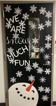 a door decorated to look like a snowman