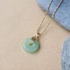 DESCRIPTION: This dainty round jade pendant necklace features a beautiful green gemstone coin set in gold. Perfect for everyday wear, it adds a touch of elegance and makes an ideal gift for friends or loved ones. BEST FEATURES: Genuine round jade gemstone for a vibrant, natural look. Gold setting adds a luxurious and timeless appeal. Dainty coin pendant for a minimalist style. Versatile design, ideal for layering or wearing solo. Lightweight and comfortable for daily wear. ADVANTAGES: Jade is kn Jade Pendant Necklace, Customer Gifts, Necklace Elegant, Coin Set, Necklace Green, Jade Necklace, Jewelry For Her, Green Necklace, Green Gemstones