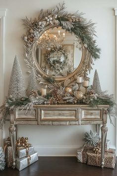 a christmas mantle decorated with pine cones, silver and gold ornaments and presents under a mirror