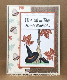 a card with a witches hat and broom on it's side, saying it's all in the accessories