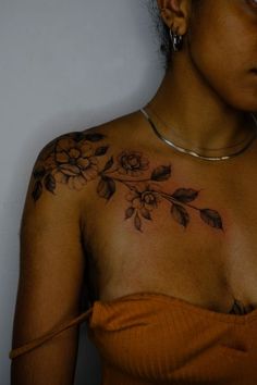 Explore the 50 Best Tattoo Ideas (2024) • Tattoodo Shoulder Tattoo On Black Women, Collar Bone Wrap Around Tattoo, Flower Shoulder Tattoo Black Women, Tattoos On Brown Skin Women, Inner Shoulder Tattoos For Women, Chest Tattoo Female Upper Shoulder, Shoulder Tattoos Black Women, Chest Tattoo Female Black Women, Collar Bone Tattoo Black Women