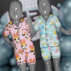 two mannequins dressed in pajamas standing next to each other