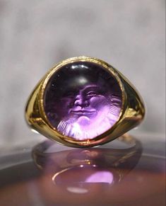 Our signature Sun Face hides behind a beautiful Amethyst set in 18k Yellow Gold. Sunset Ring, Anthony Lent, Amethyst Set, History Of Art, Sun Face, Solid Gold Ring, Solid Gold Rings, Purple Rain, Lovely Jewellery