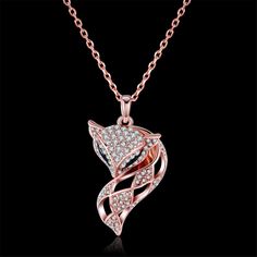 Complete casual or dressy looks with a subtle hint of shimmer when you add on this crystal-adorned pendant crafted from 18k rose gold-plated copper. Chain : 18" L with 2" extender Pendant : 1.1" W x 1.7" H Lobster claw clasp 18k rose gold-plated copper / cubic zirconia Fox Pendant, 18k Rose Gold, Rose Gold Plates, Cubic Zirconia, Diamond Necklace, Gold Plate, Copper, Plating, Rose Gold