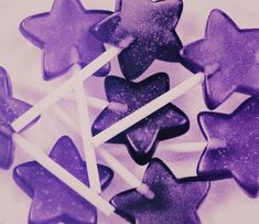 purple and white star shaped lollipop sticks