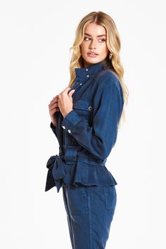 Drop shoulder jacket with front patch pockets and cinched waist. Versatile jacket for anywear is a MUST add to wardrobe! Solid color woven on relaxed fit.Body length from HPS: 23 1/2", Sleeve length: 22", Bust: 44" (Size Small) 100% TENCEL Machine wash cold, Tumble dry low Imported Blue Utility Denim Jacket With Patch Pockets, Blue Outerwear With Pockets And Relaxed Fit, Casual Washed Blue Utility Jacket With Pockets, Blue Utility Jacket With Pockets And Relaxed Fit, Spring Blue Utility Jacket With Patch Pockets, Blue Utility Jacket With Pockets, Blue Outerwear With Side Pockets, Navy Utility Jacket With Pockets For Fall, Casual Blue Utility Jacket With Patch Pockets