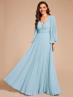 This custom size floor-length chiffon evening dress features a stunning deep V-neck design. The A-line silhouette is complemented by delicate ruffle sleeves, creating a timeless and sophisticated look perfect for any formal occasion. Length: Floor length. Sleeve Style: Long sleeves. Closure: It is concealed a zipper up the back. Undergarments: It is padded, with lining. Fabric:The garment comprises Chiffon. Stretch: Fabric is no stretch. Chiffon V-neck Gown For Gala, Elegant Light Blue V-neck Evening Dress, Light Blue V-neck Evening Gown, Light Blue V-neck Maxi Dress For Wedding, Light Blue Flowy Chiffon Dress With V-neck, Elegant Light Blue V-neck Maxi Dress, Blue V-neck Maxi Dress With Pleated Bodice, Elegant Light Blue Chiffon Maxi Dress, Flowy Chiffon V-neck Gown