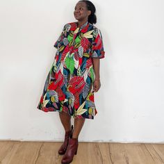 You will glow in our furaha dress. Furaha means happiness in Swahili. Our loose fit colourful dresses made out of non-stretchy African print are perfect for you in case you are looking for a style idea that is versatile, comfortable, and looks fabulous year-round. All materials used to design the dresses are sourced in Kenya.  MEASUREMENT GUIDE:  We recommend asking questions about sizes or you can take your own measurements (at the bust) if unsafe. Since its an A- Line, you only need to ensure Casual Multicolor Dresses With Bold Print, Casual Multicolor Bold Print Dresses, Casual Multicolor Dress With Bold Print, Red Vacation Dresses With Pockets, Red Vacation Dress With Pockets, Casual Dresses With Bold Multicolor Print, Red Short Sleeve Dress With Colorful Pattern, Short Sleeve Bold Multicolor Print Dress, Multicolor Bold Print Short Sleeve Dress