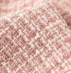 closeup of a pink and white tweed fabric