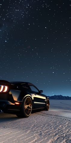 a car parked on the side of a snowy road under a night sky filled with stars