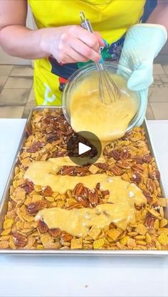 the woman is mixing ingredients into her homemade granola recipe for desserts and snacks