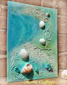 an art piece with shells on it and the words seashells painted on it